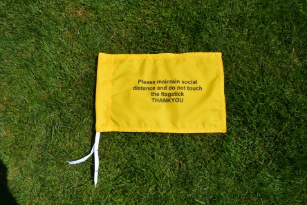 golf flags with social distance message