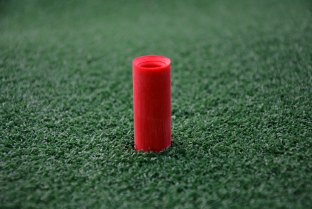 rubber tee in mat for driver shots