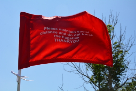 tie-on flag for golf course with printed text