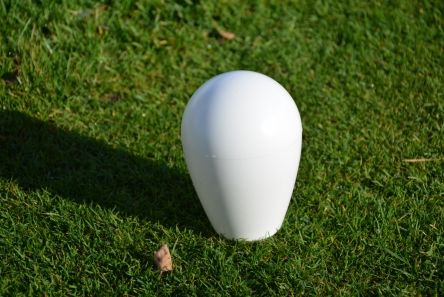white pear shape plastic golf tee marker
